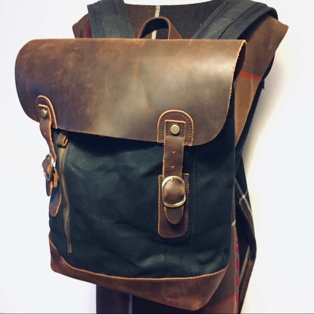 Unisex canvas and leather saddle bag backpack